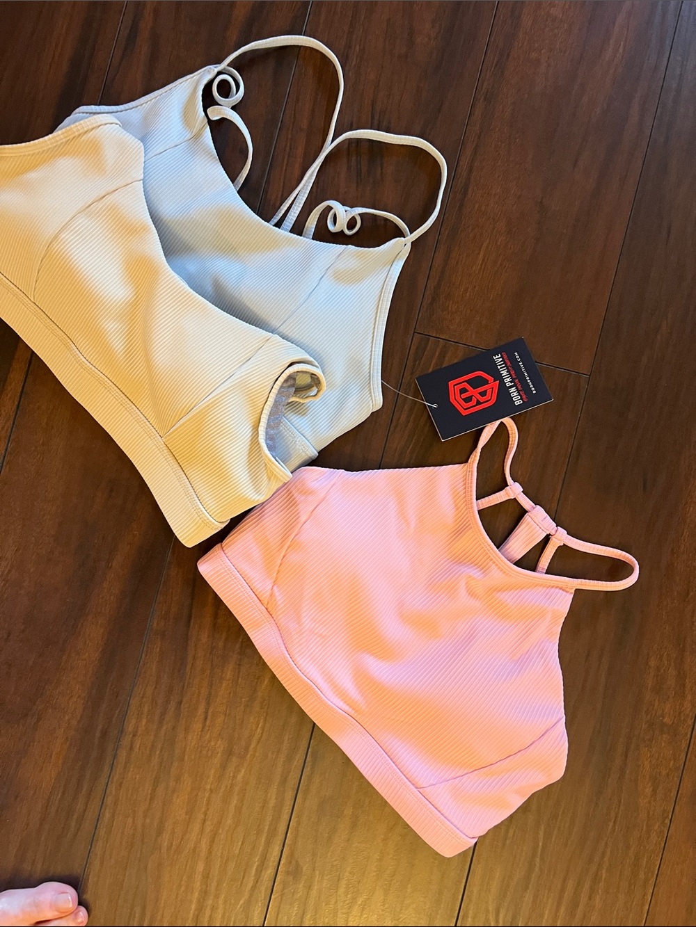 Trio of Born Primitive sports bra tops with removable pads  size L, brand new